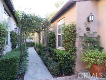 44 Duet Irvine, CA 92603 - Photo 18 of 18 a view of a pathway with a house in the background