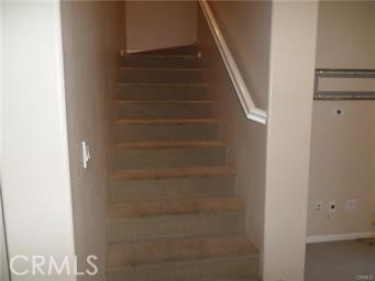 44 Duet Irvine, CA 92603 - Photo 9 of 18 a view of staircase with white walls