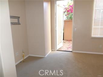 44 Duet Irvine, CA 92603 - Photo 10 of 18 a view of an empty room and a window