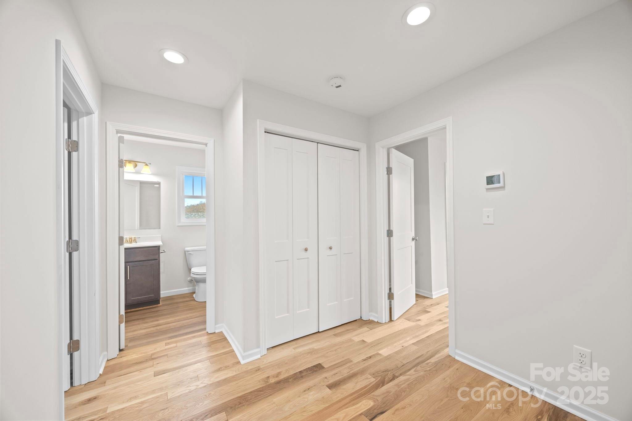 7 Berry Crest Lane Arden, NC 28704 - Photo 39 of 41 a view of a room with wooden floor and a bathroom