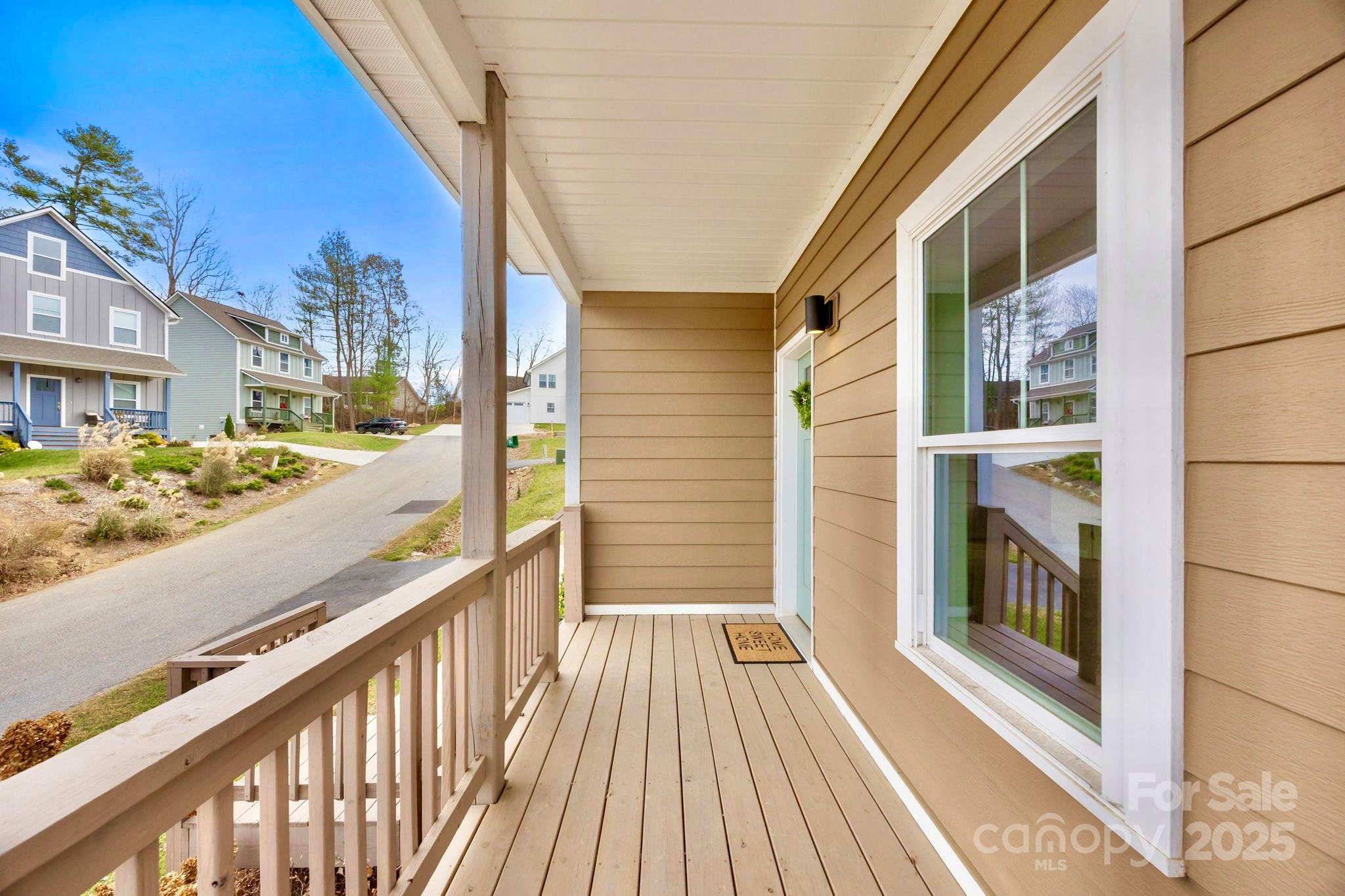 7 Berry Crest Lane Arden, NC 28704 - Photo 6 of 41 a view of a house with a large window