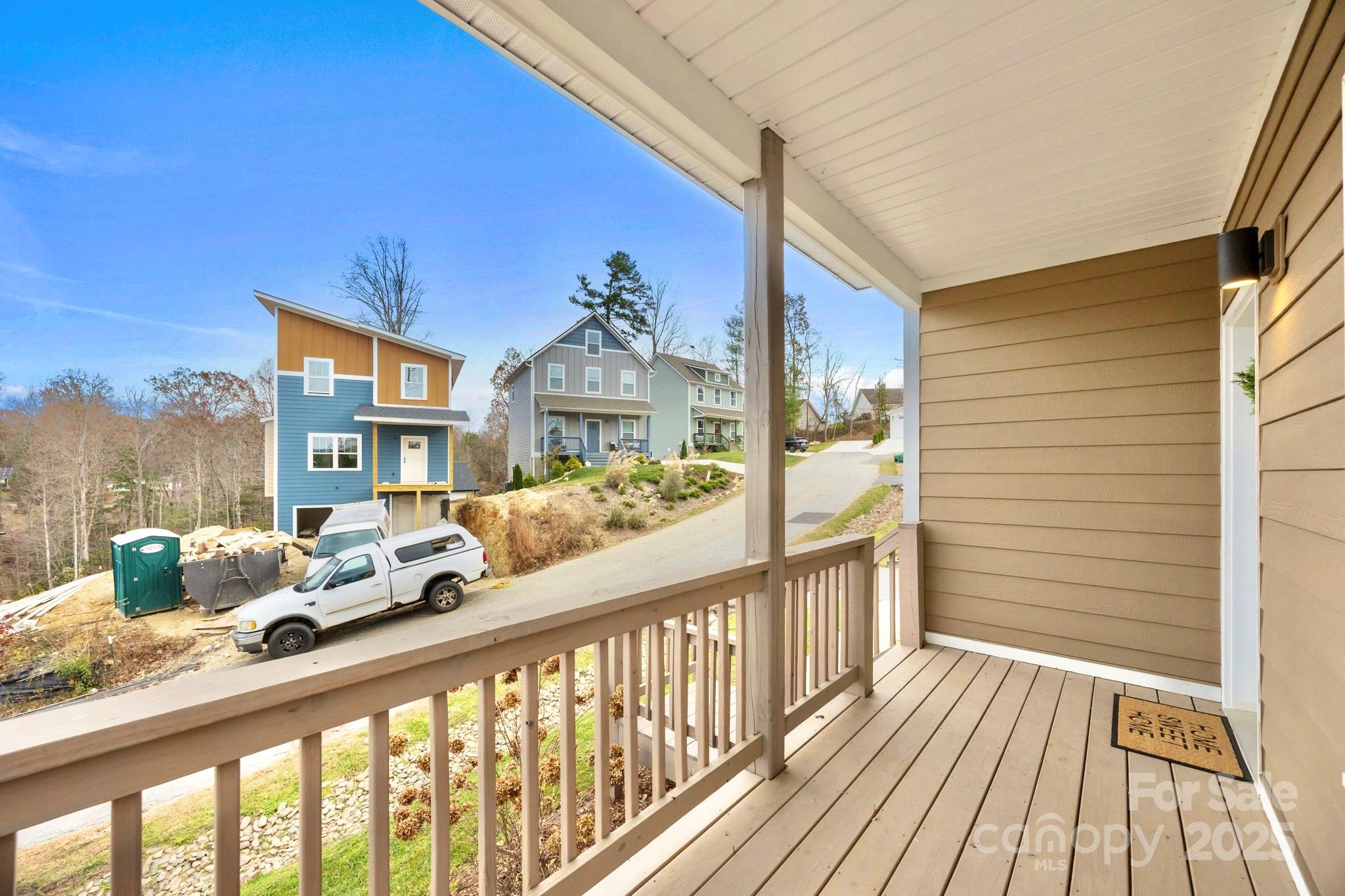 7 Berry Crest Lane Arden, NC 28704 - Photo 7 of 41 a view of a balcony with chairs