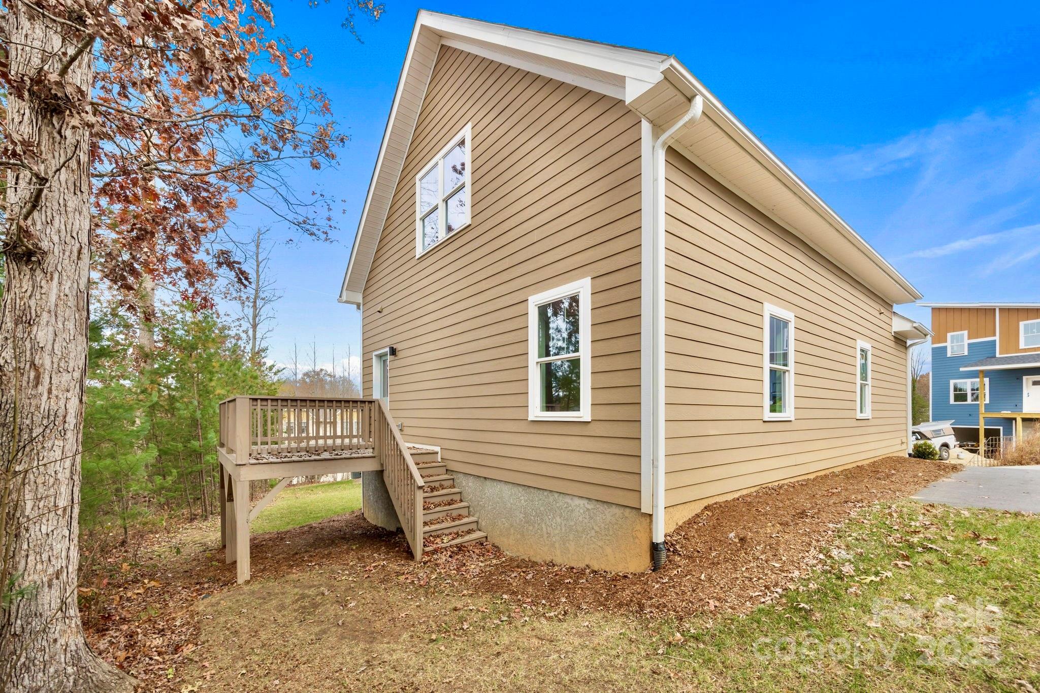 7 Berry Crest Lane Arden, NC 28704 - Photo 9 of 41 a view of a house with a yard