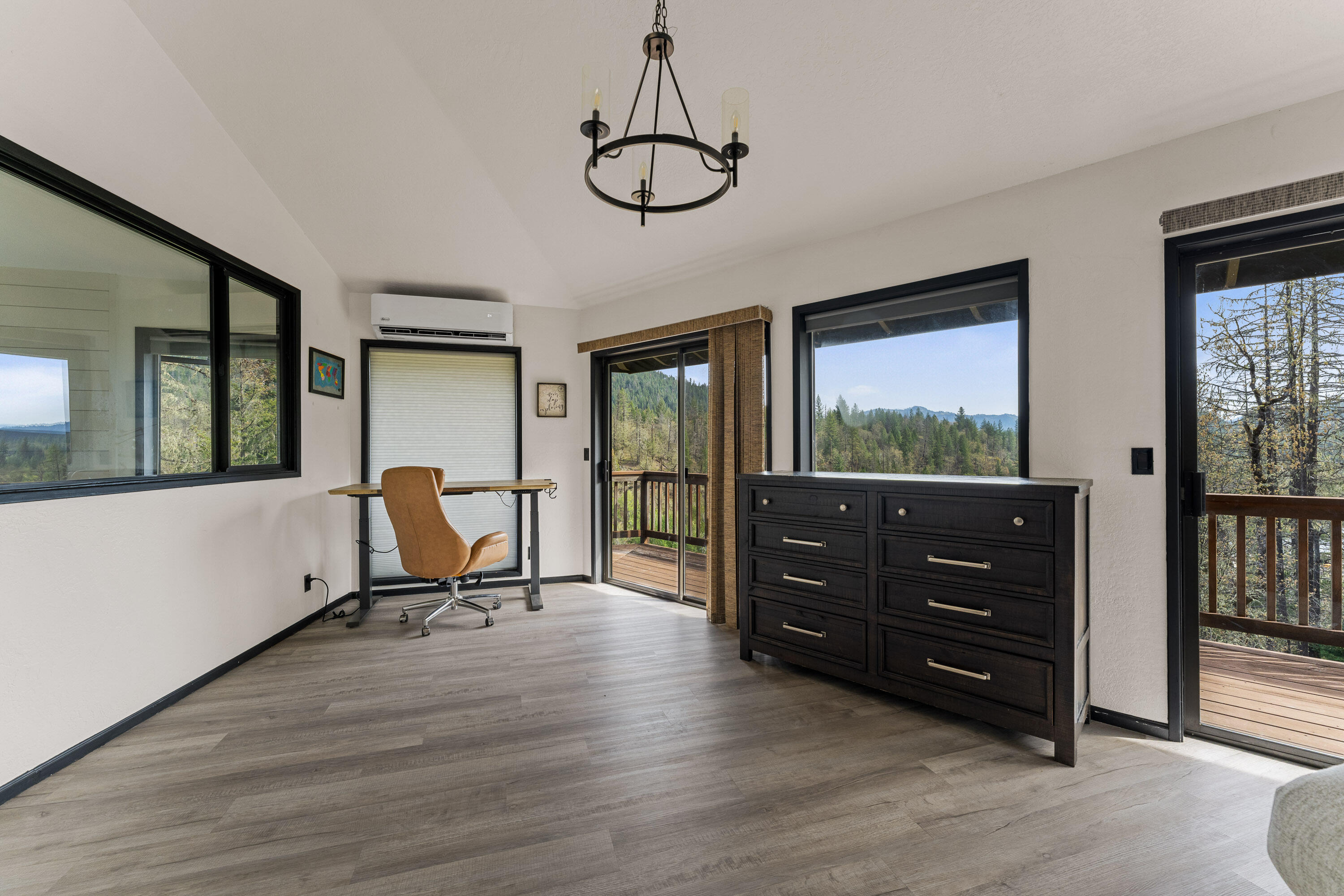 7201 Crowfoot Road Trail, OR 97541 - Photo 24 of 56 a view of a workspace with furniture and windows