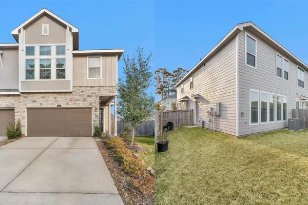 a view of a house with a yard and garage