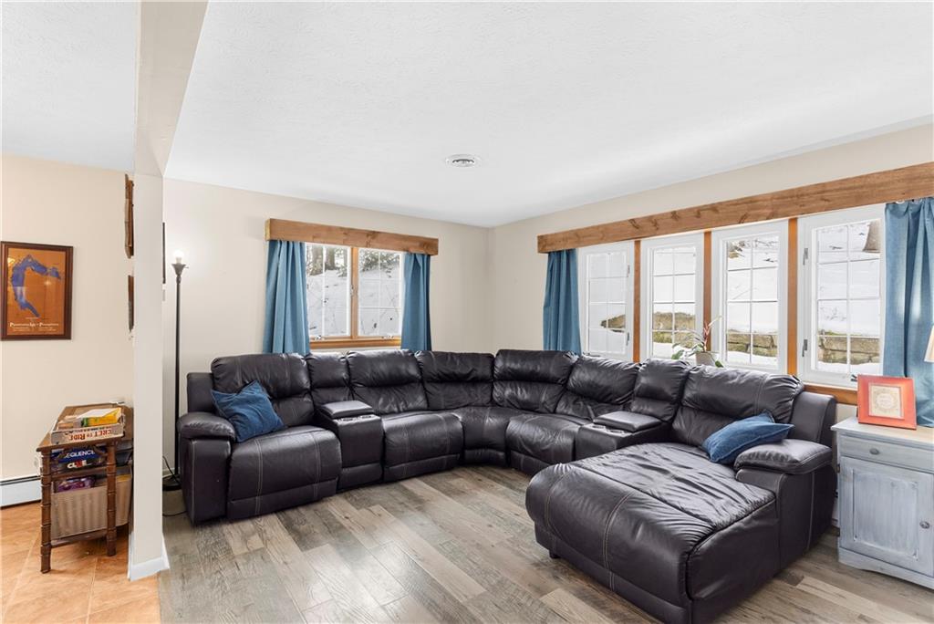 522 Spring Street Jamestown, PA 16134 - Photo 12 of 35 a living room with furniture and a large window
