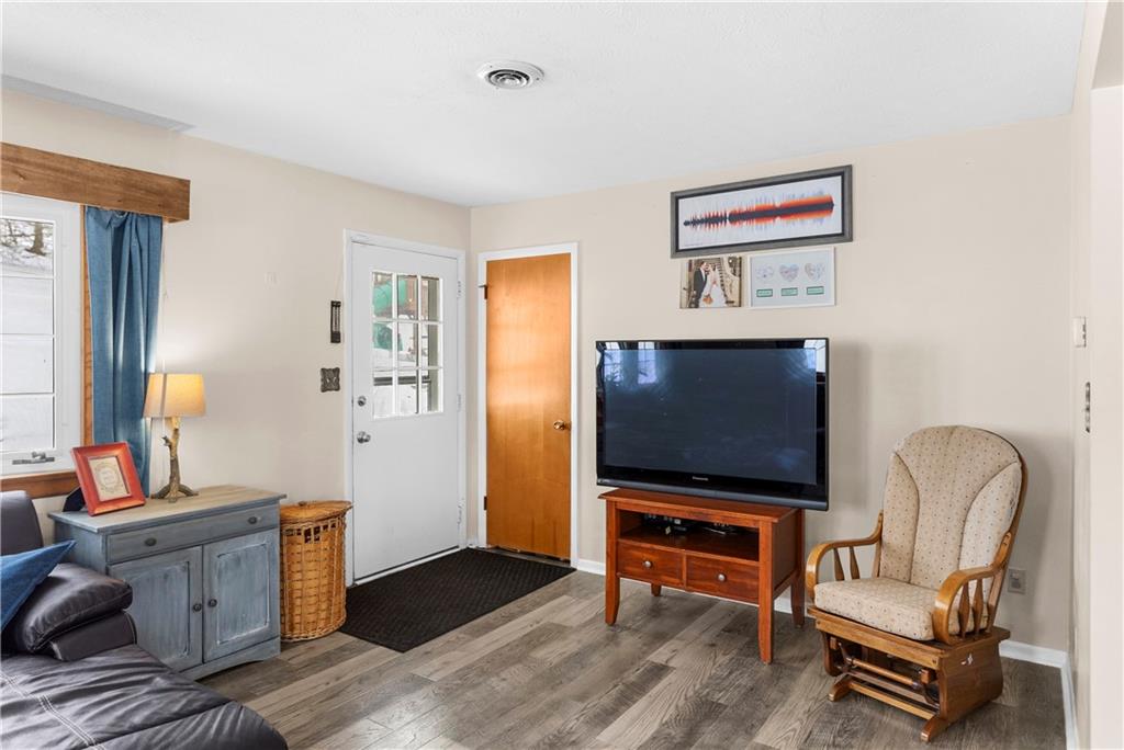 522 Spring Street Jamestown, PA 16134 - Photo 13 of 35 a living room with furniture and a flat screen tv
