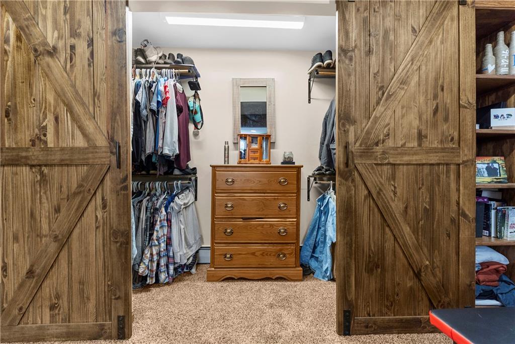 522 Spring Street Jamestown, PA 16134 - Photo 16 of 35 a view of walk in closet with clothes