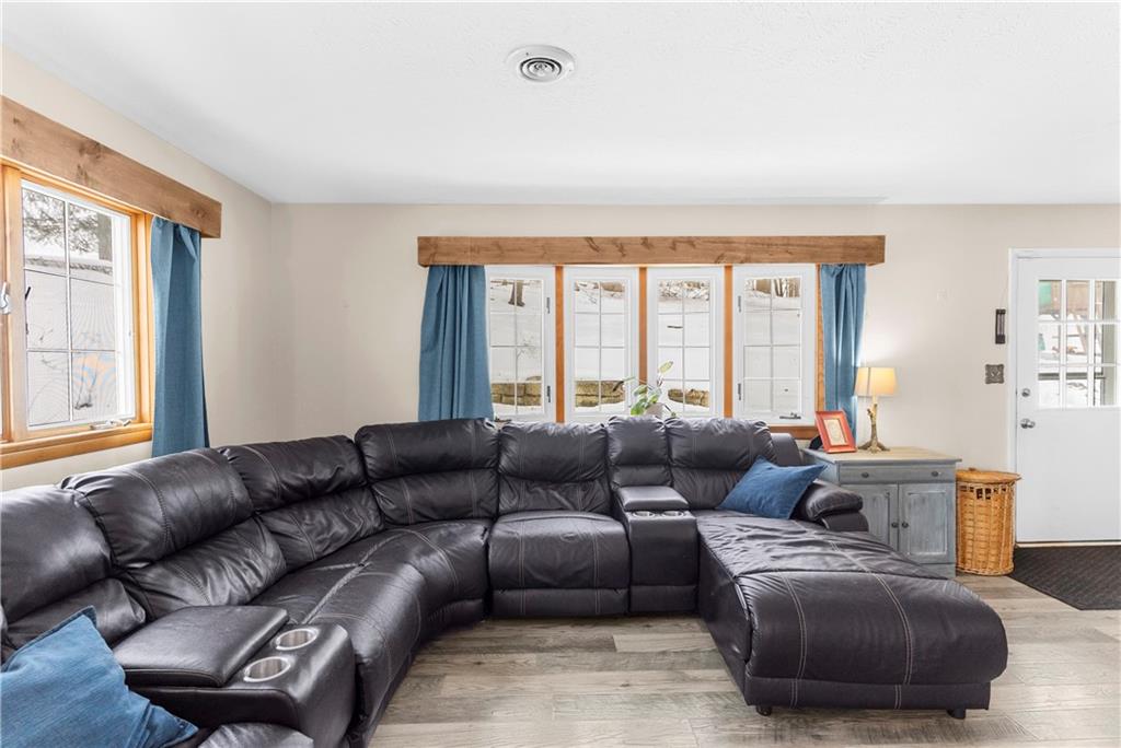 522 Spring Street Jamestown, PA 16134 - Photo 17 of 35 a living room with furniture and a large window