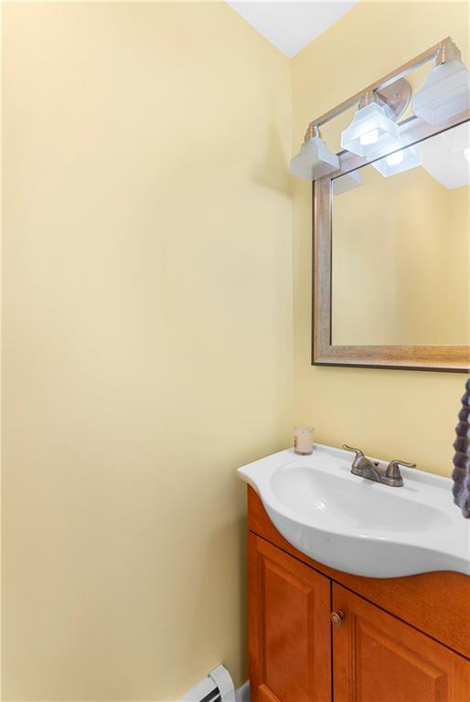 522 Spring Street Jamestown, PA 16134 - Photo 22 of 35 a bathroom with a sink and a mirror