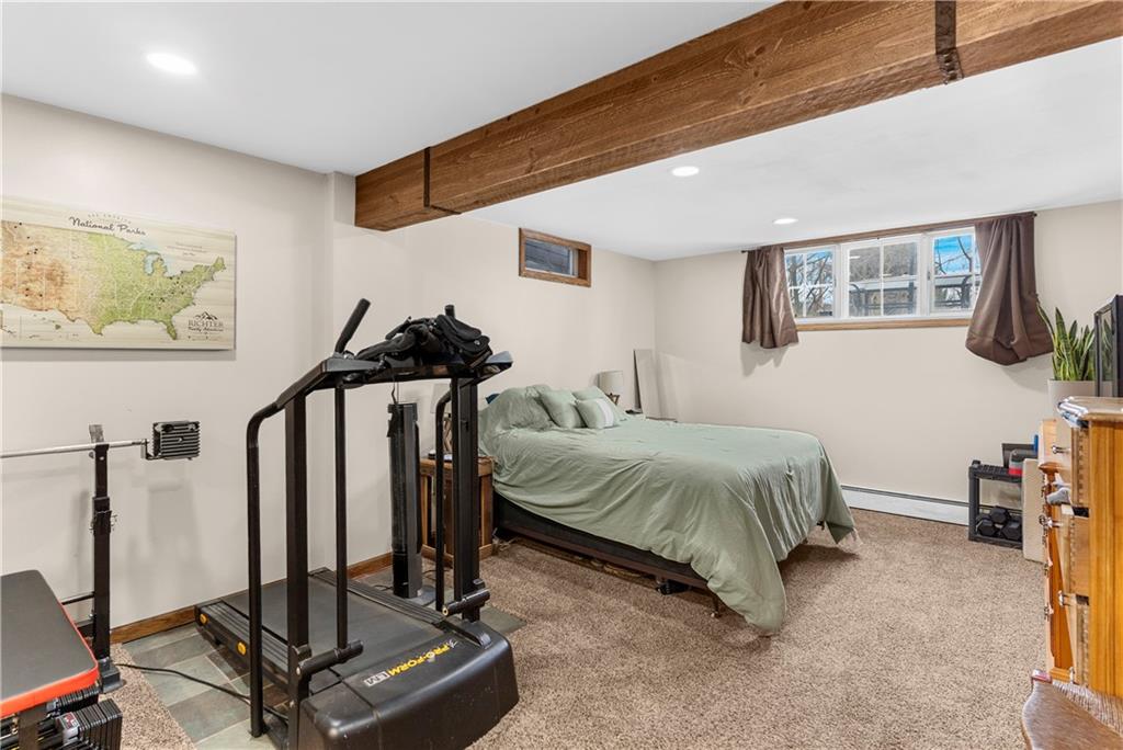 522 Spring Street Jamestown, PA 16134 - Photo 23 of 35 a bedroom with a bed a desk and chair