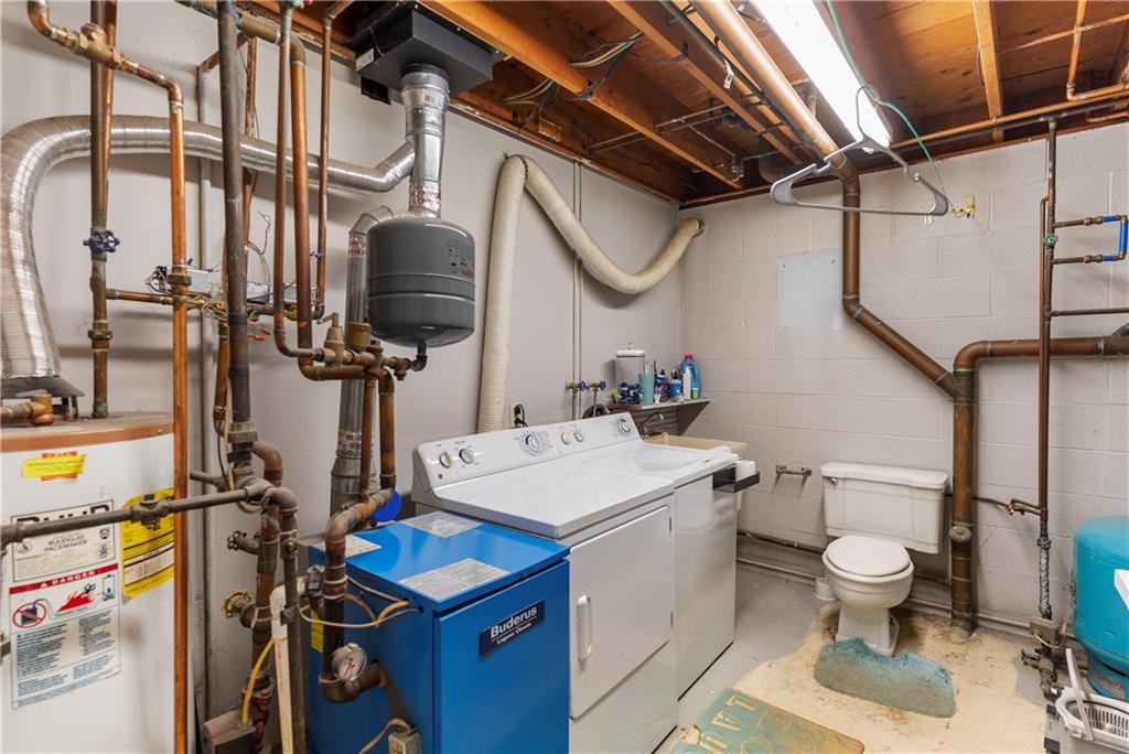 522 Spring Street Jamestown, PA 16134 - Photo 25 of 35 a bathroom with a sink a toilet and a mirror