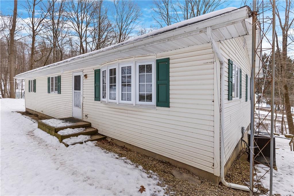 522 Spring Street Jamestown, PA 16134 - Photo 27 of 35 a front view of a house with sitting area