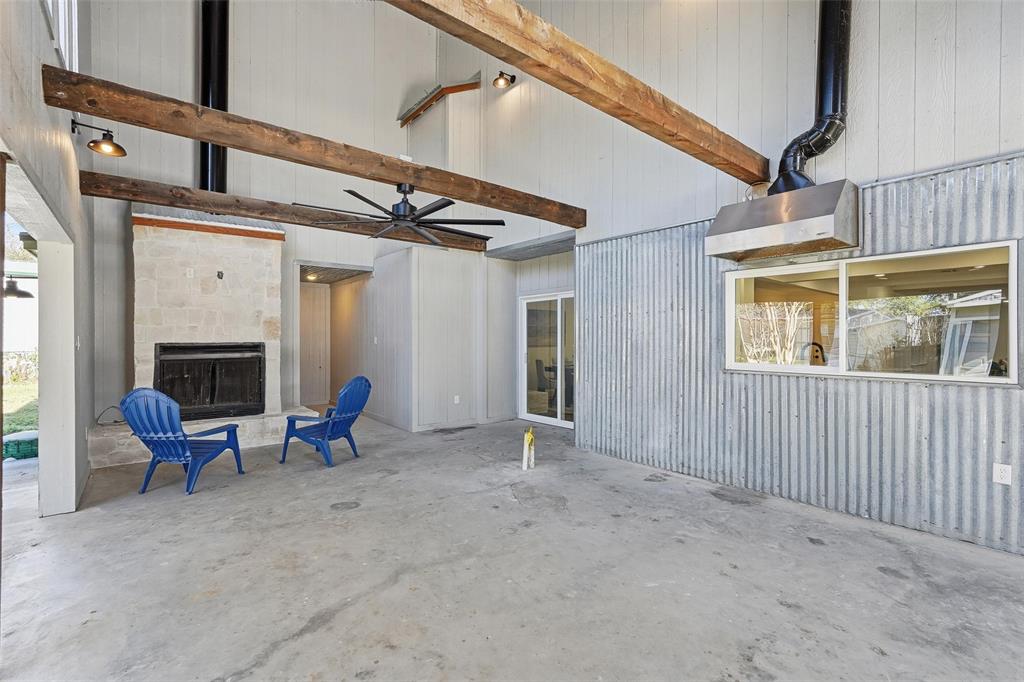 9938 John Flowers Road Wills Point, TX 75169 - Photo 24 of 40 View of patio on looking fireplace and a ceiling fan
