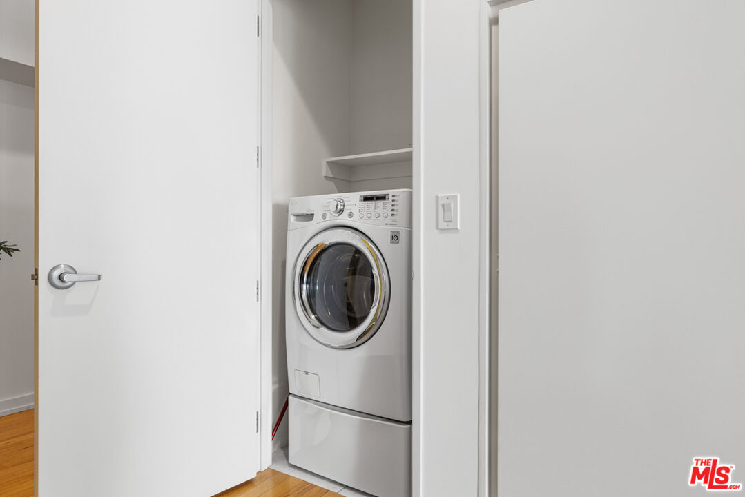 801 South Grand Avenue, Unit 1508 Los Angeles, CA 90017 - Photo 38 of 56 a close up view of a washer and dryer