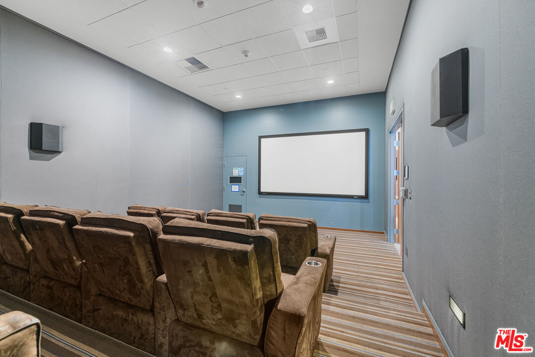 801 South Grand Avenue, Unit 1508 Los Angeles, CA 90017 - Photo 50 of 56 a view of a room with gym equipment