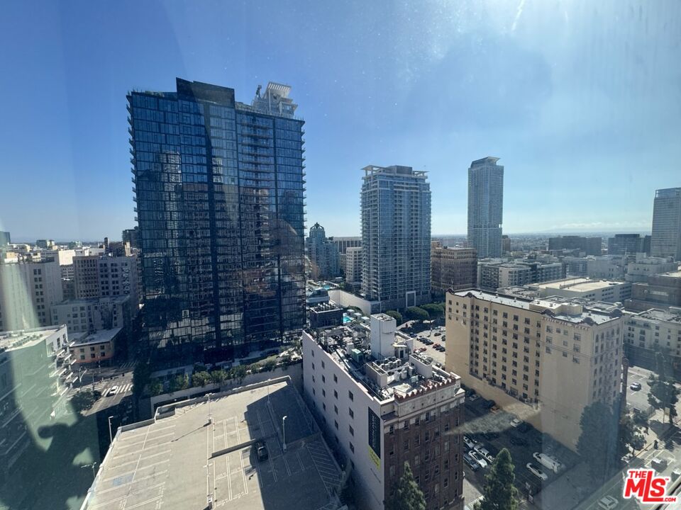 801 South Grand Avenue, Unit 1508 Los Angeles, CA 90017 - Photo 53 of 56 a view of a city with tall buildings