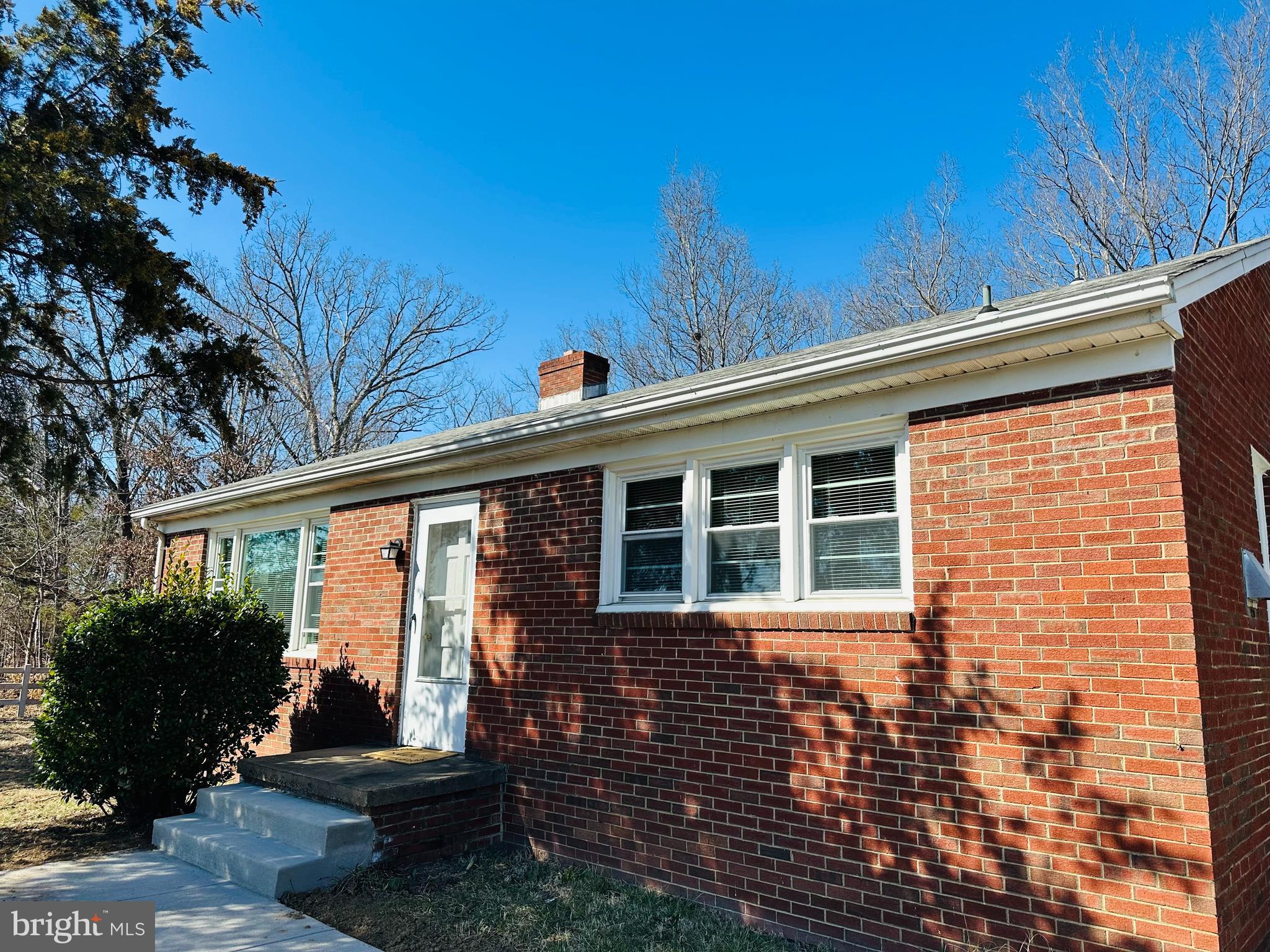 11447 Marsh Road Bealeton, VA 22712 - Photo 1 of 9 a view of a house with backyard and garden