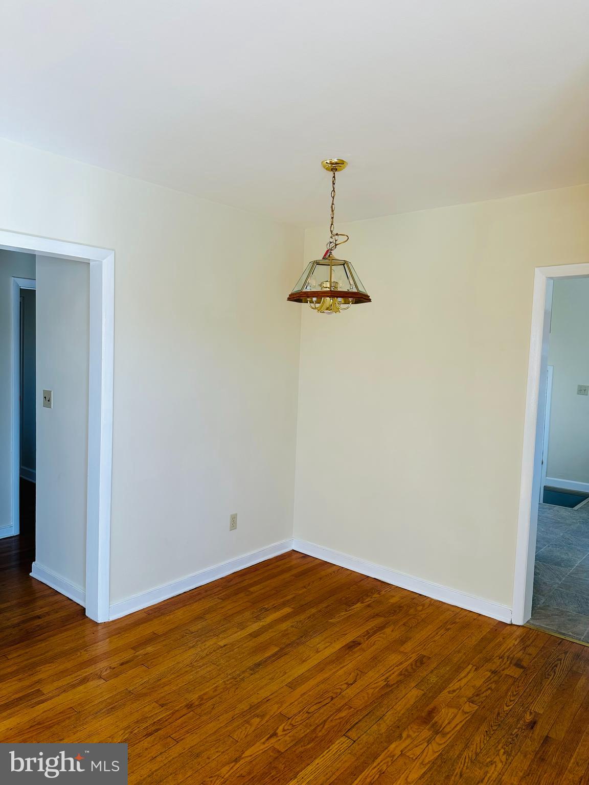 11447 Marsh Road Bealeton, VA 22712 - Photo 4 of 9 a view of empty room with wooden floor