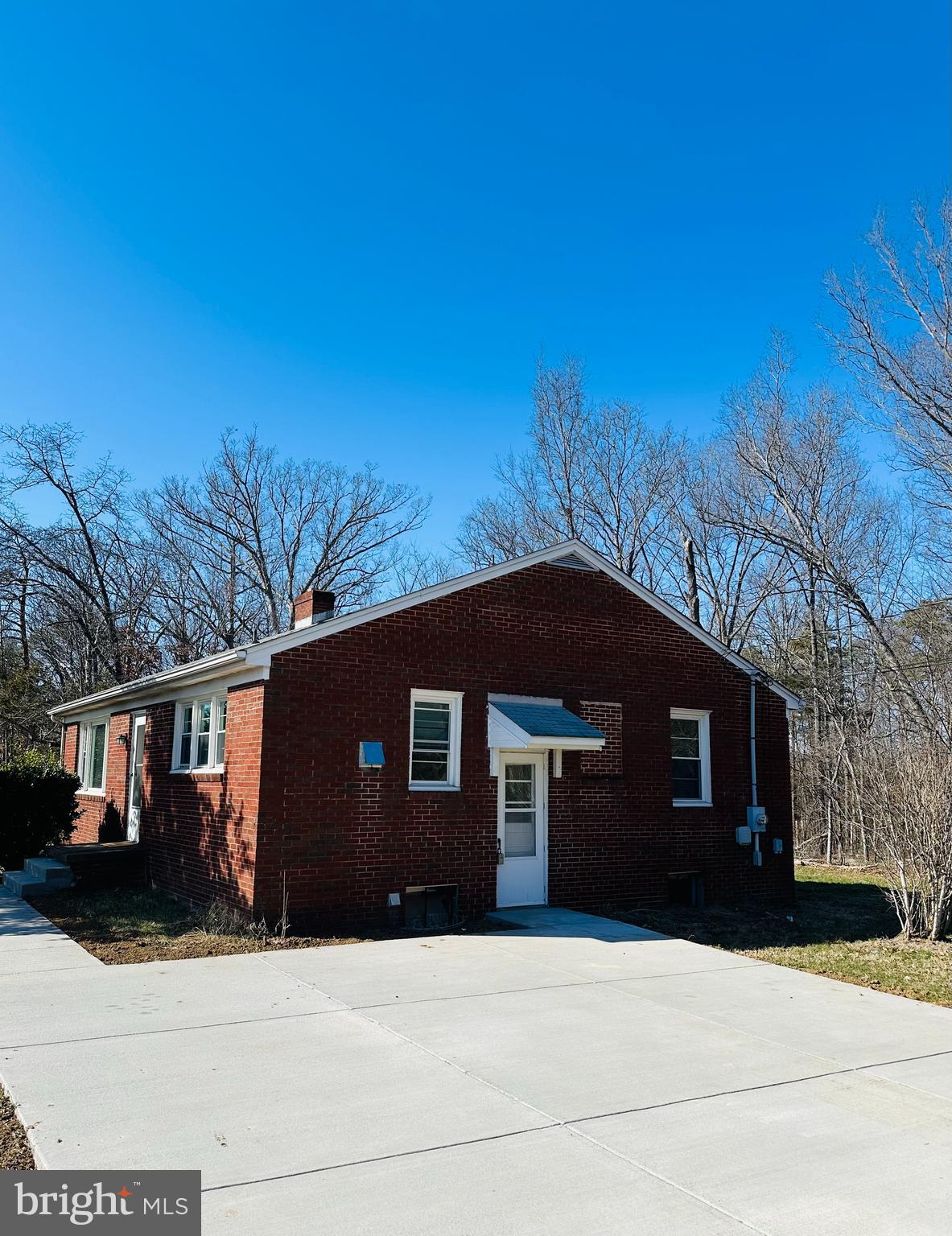 11447 Marsh Road Bealeton, VA 22712 - Photo 9 of 9 a front view of a house with a yard