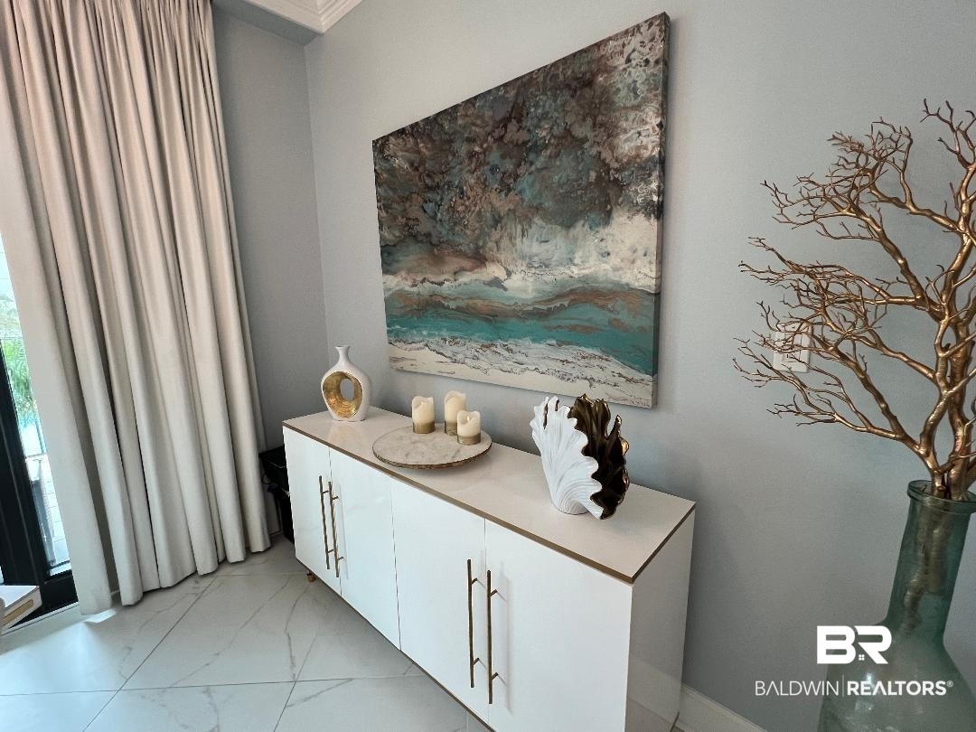 27580 Canal Road, Unit 1210 Orange Beach, AL 36561 - Photo 11 of 28 Bathroom with light marble finish flooring and crown molding