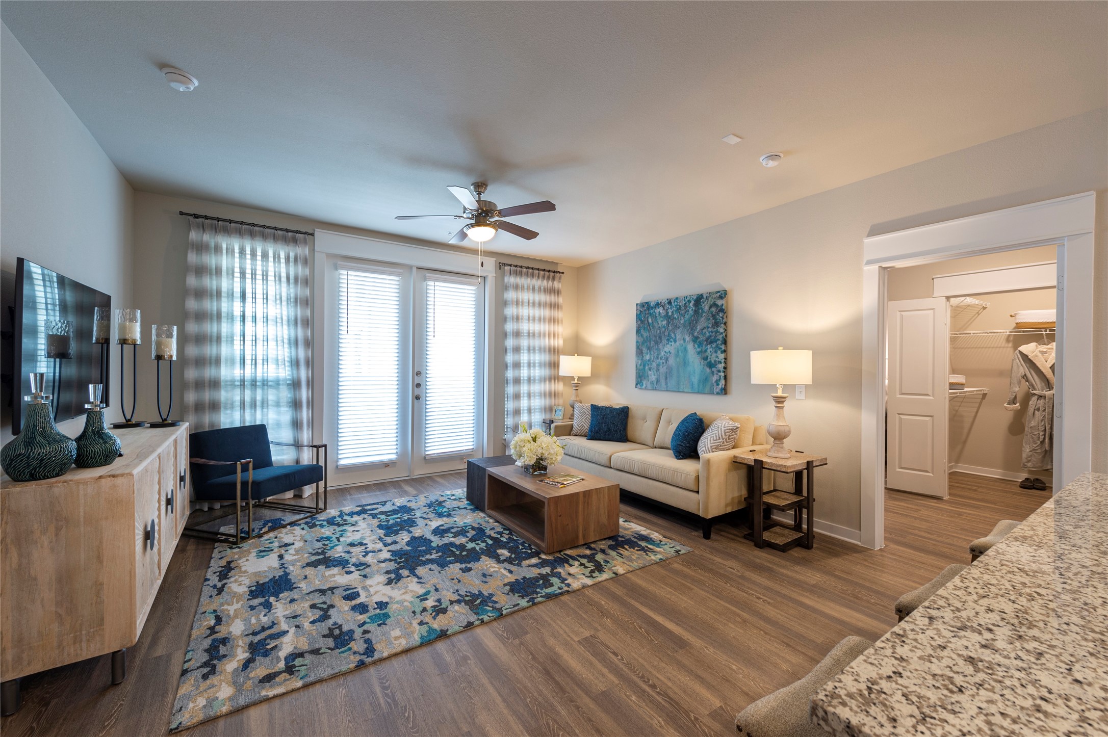 1616 Partnership Way, Unit 2219 Katy, TX 77449 - Photo 10 of 22 a living room with furniture and a flat screen tv