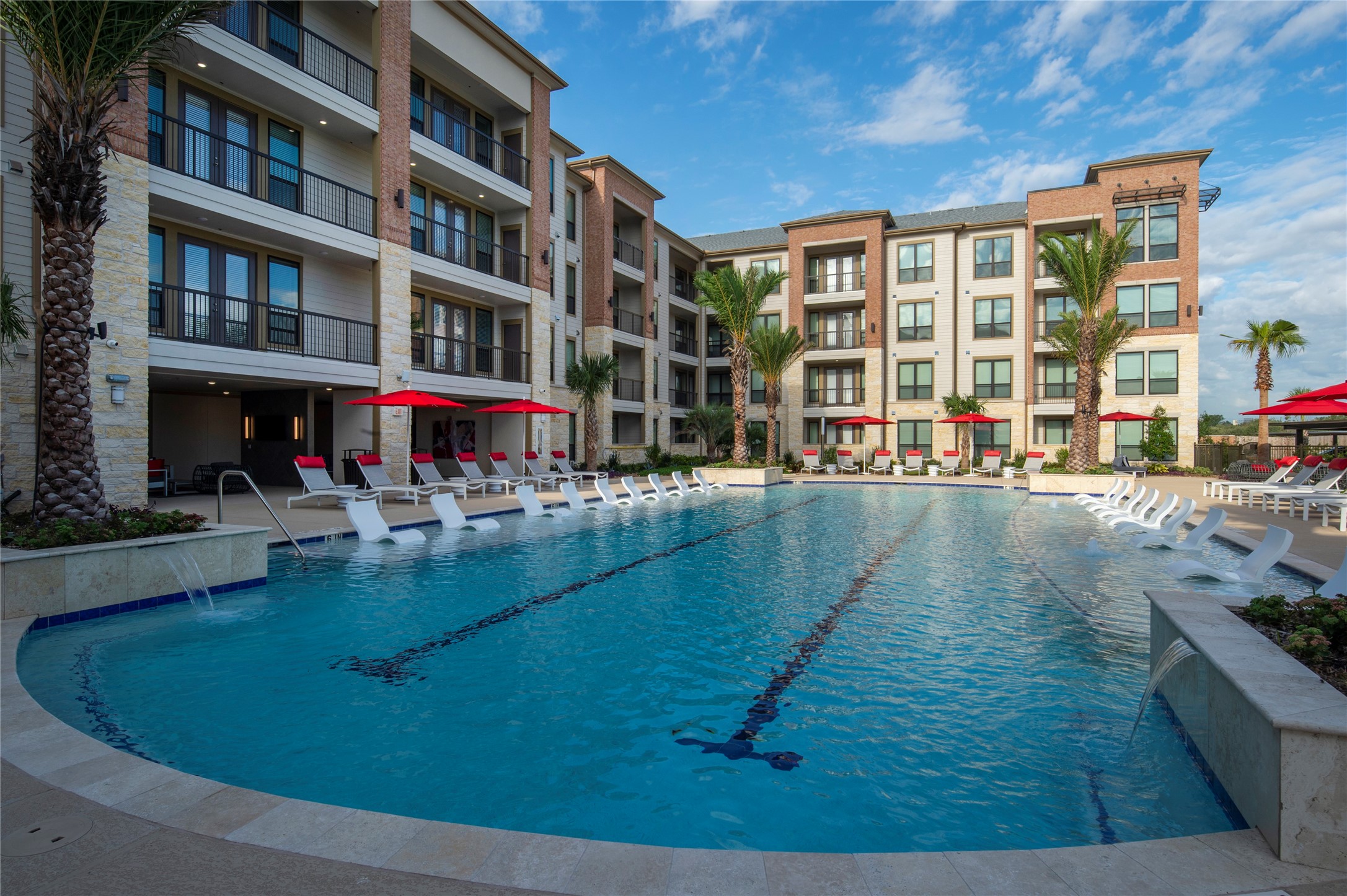 1616 Partnership Way, Unit 2219 Katy, TX 77449 - Photo 9 of 22 a view of a swimming pool with an outdoor seating