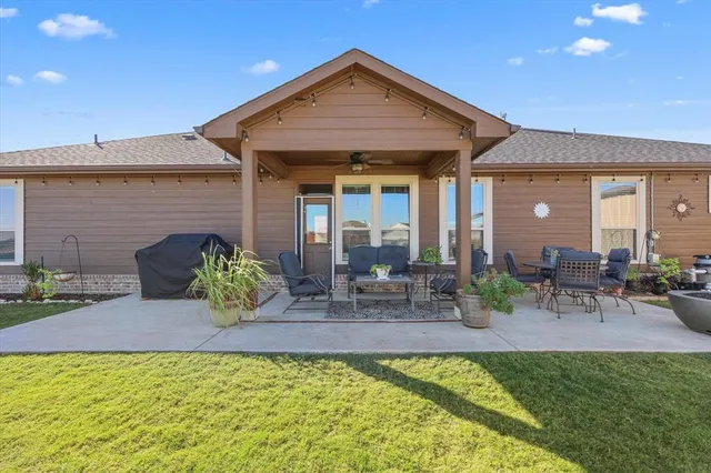 a front view of a house with patio