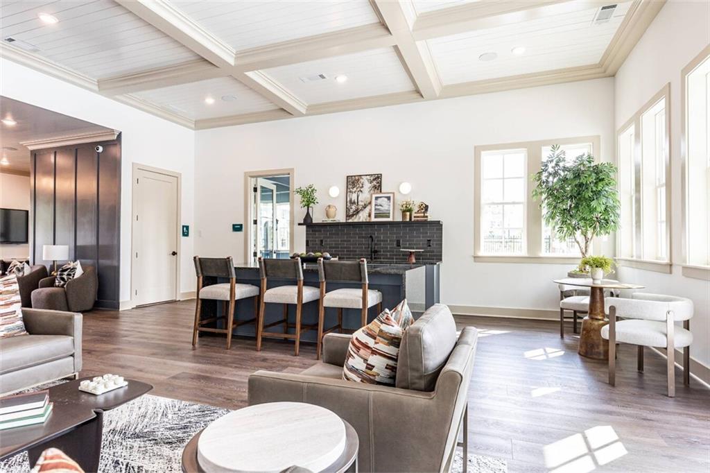 3373 Fence Road Northeast, Unit D4 Dacula, GA 30019 - Photo 11 of 40 a living room with furniture and a fireplace