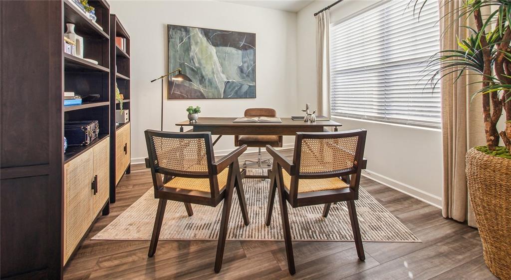 3373 Fence Road Northeast, Unit D4 Dacula, GA 30019 - Photo 26 of 40 a dining room with furniture and window