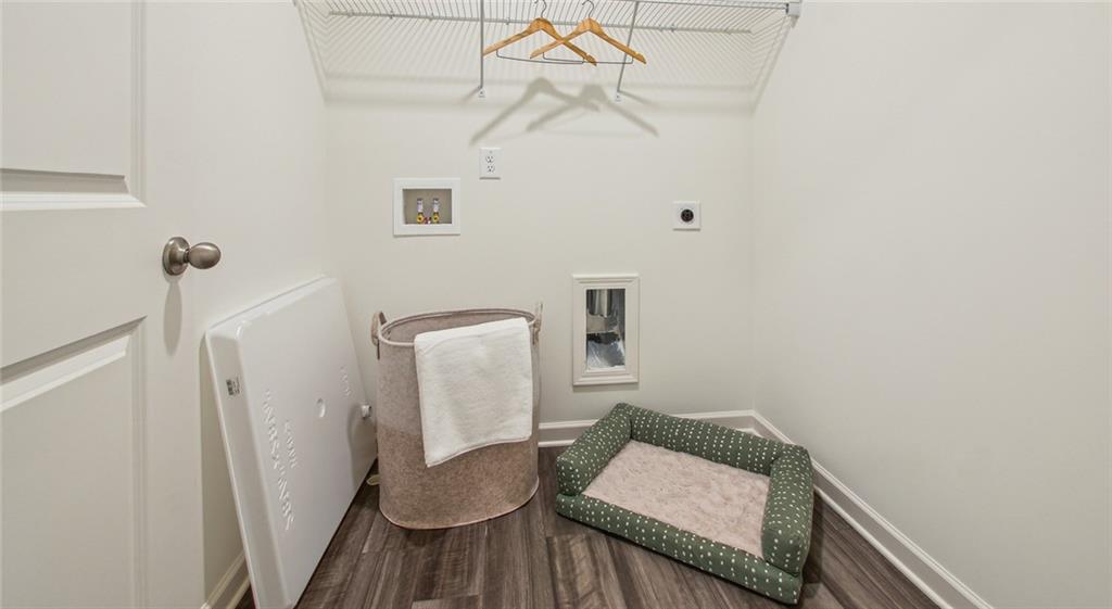 3373 Fence Road Northeast, Unit D4 Dacula, GA 30019 - Photo 34 of 40 a bathroom with a sink and toilet