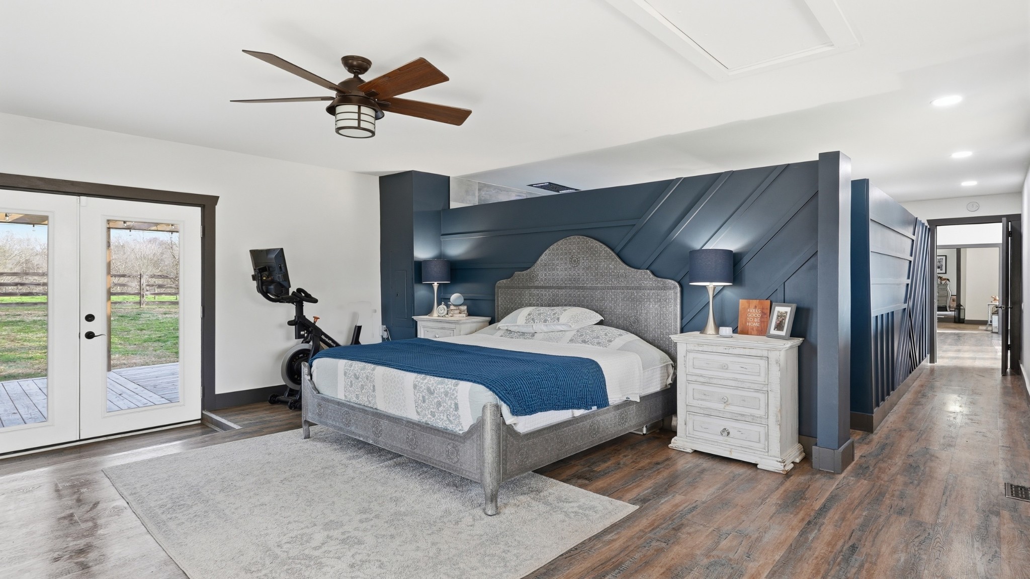 2830 Lockertsville Road Ashland City, TN 37015 - Photo 27 of 100 a bed sitting in a bedroom next to a window