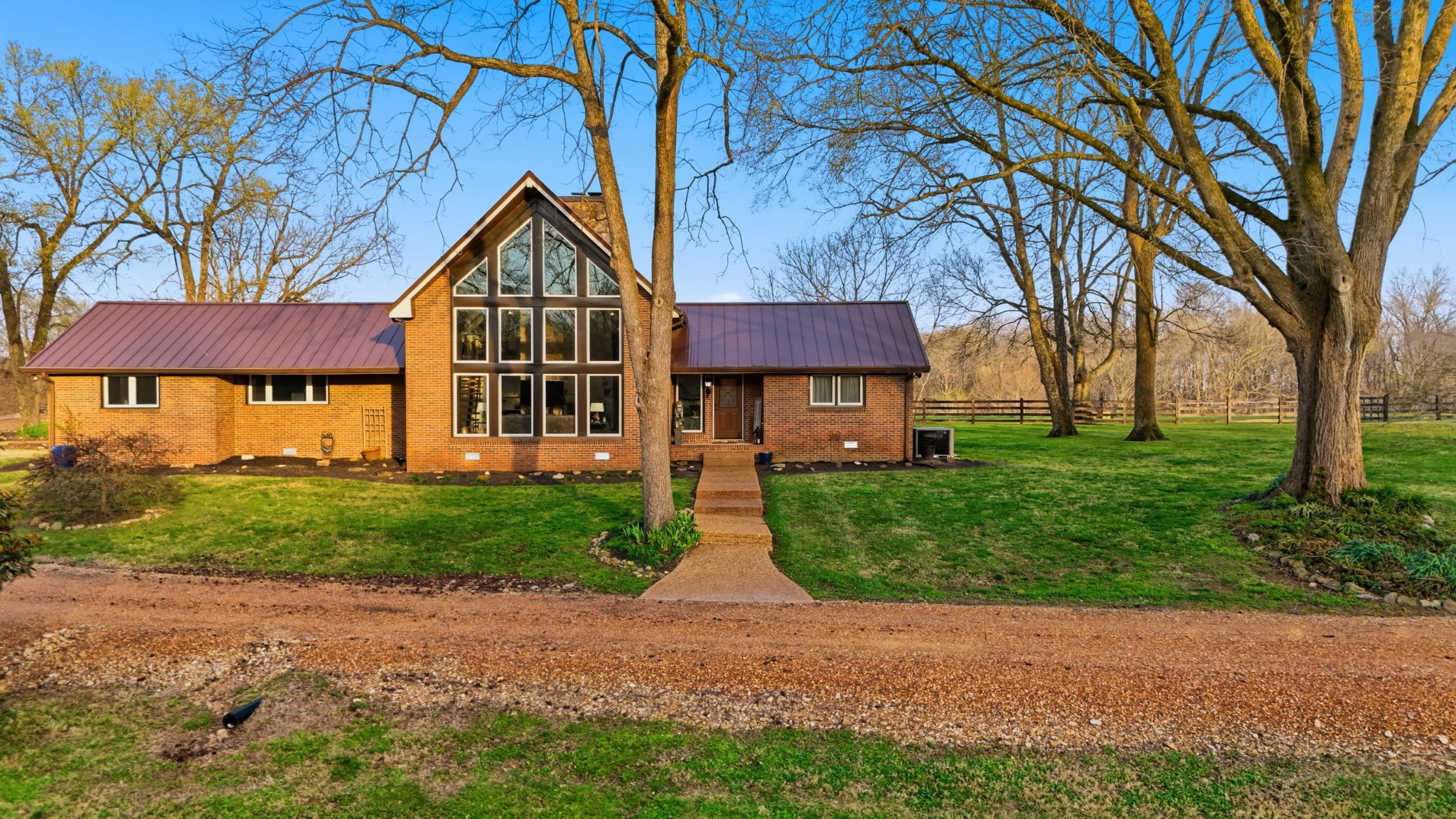 2830 Lockertsville Road Ashland City, TN 37015 - Photo 3 of 100 a view of a house with a yard and tree s