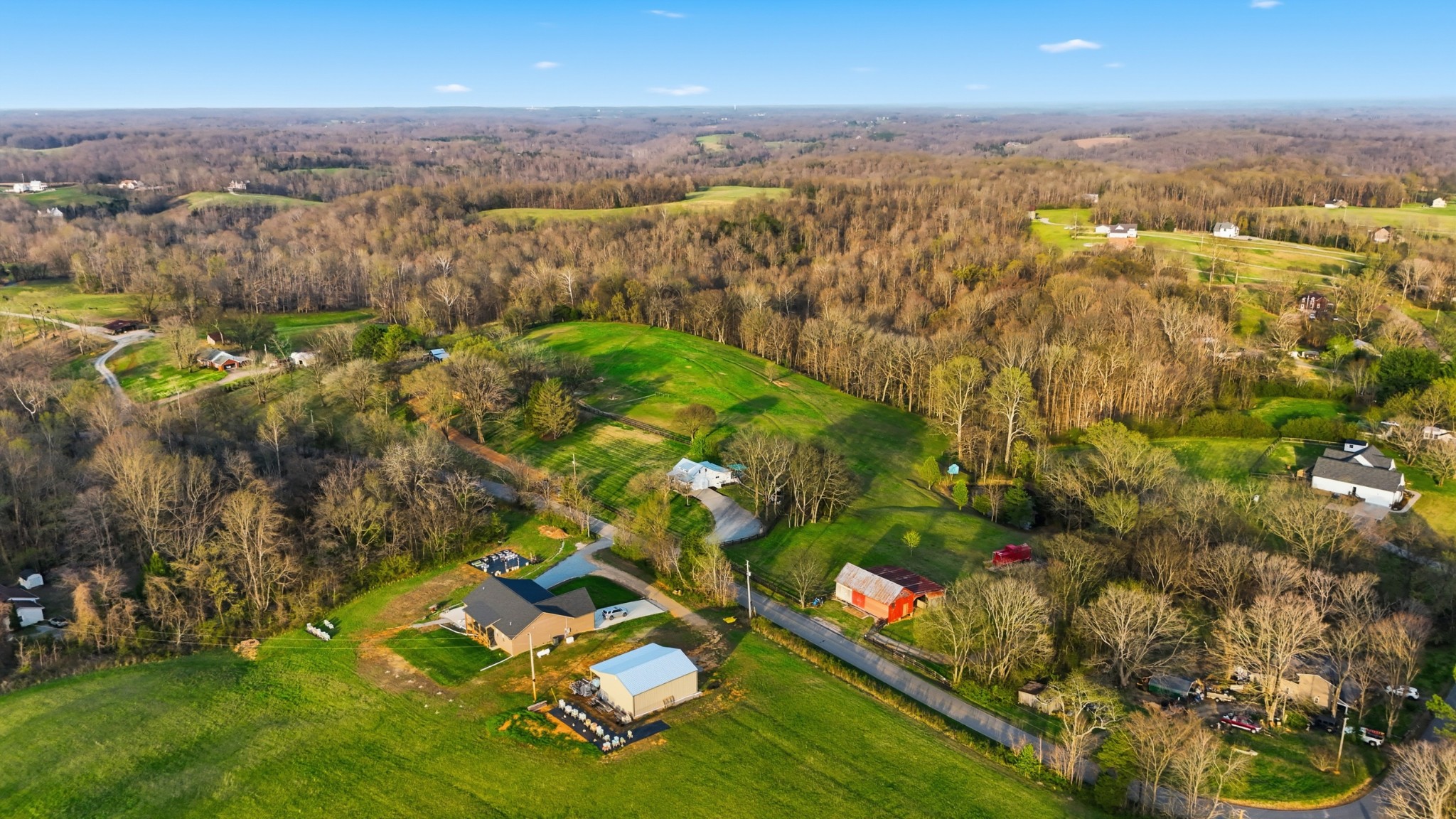 2830 Lockertsville Road Ashland City, TN 37015 - Photo 34 of 100 an aerial view of residential houses with outdoor space and trees