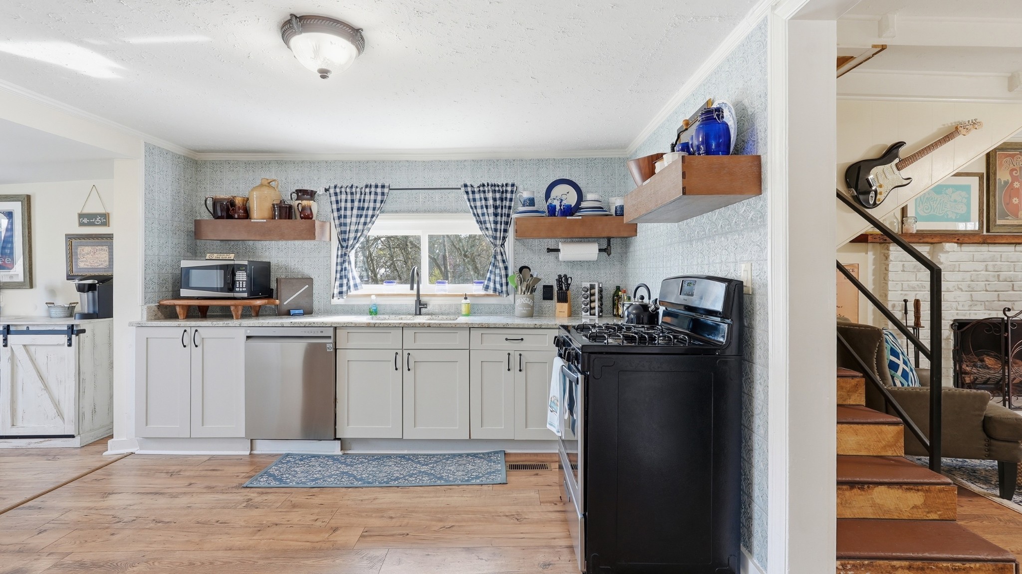 2830 Lockertsville Road Ashland City, TN 37015 - Photo 80 of 100 a kitchen with refrigerator and cabinets