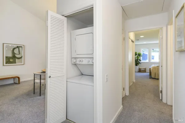 a view of a bedroom with a workspace