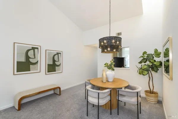 a table and chairs in a room