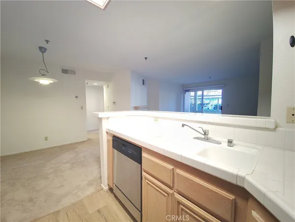a bathroom with a sink a vanity and mirror