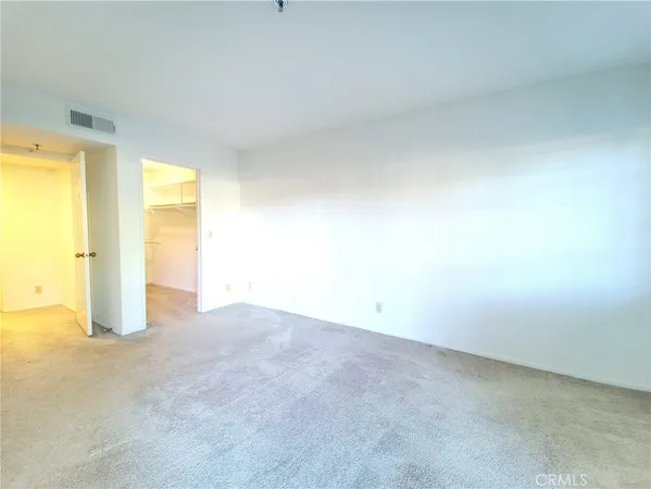 an empty room with a natural light