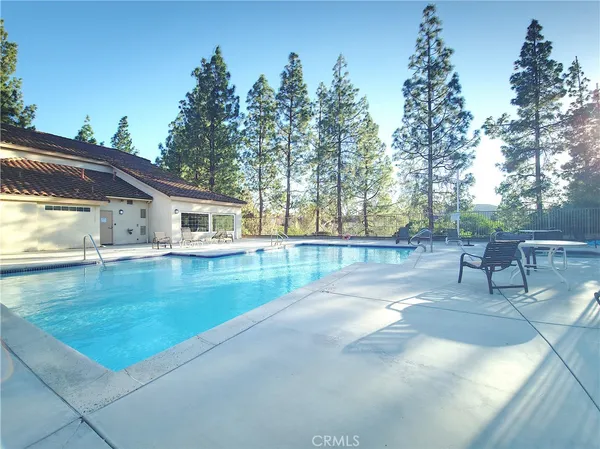 a view of a house with swimming pool