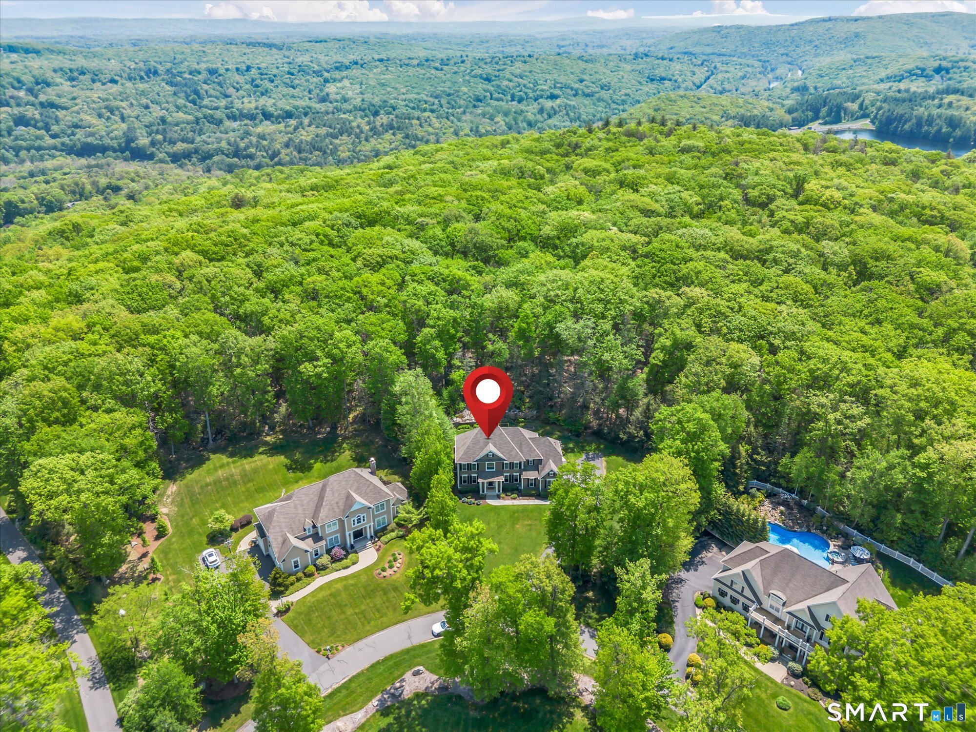 16 Sweetheart Mountain Road Canton, CT 06019 - Photo 38 of 40 an aerial view of a house with a yard and outdoor seating