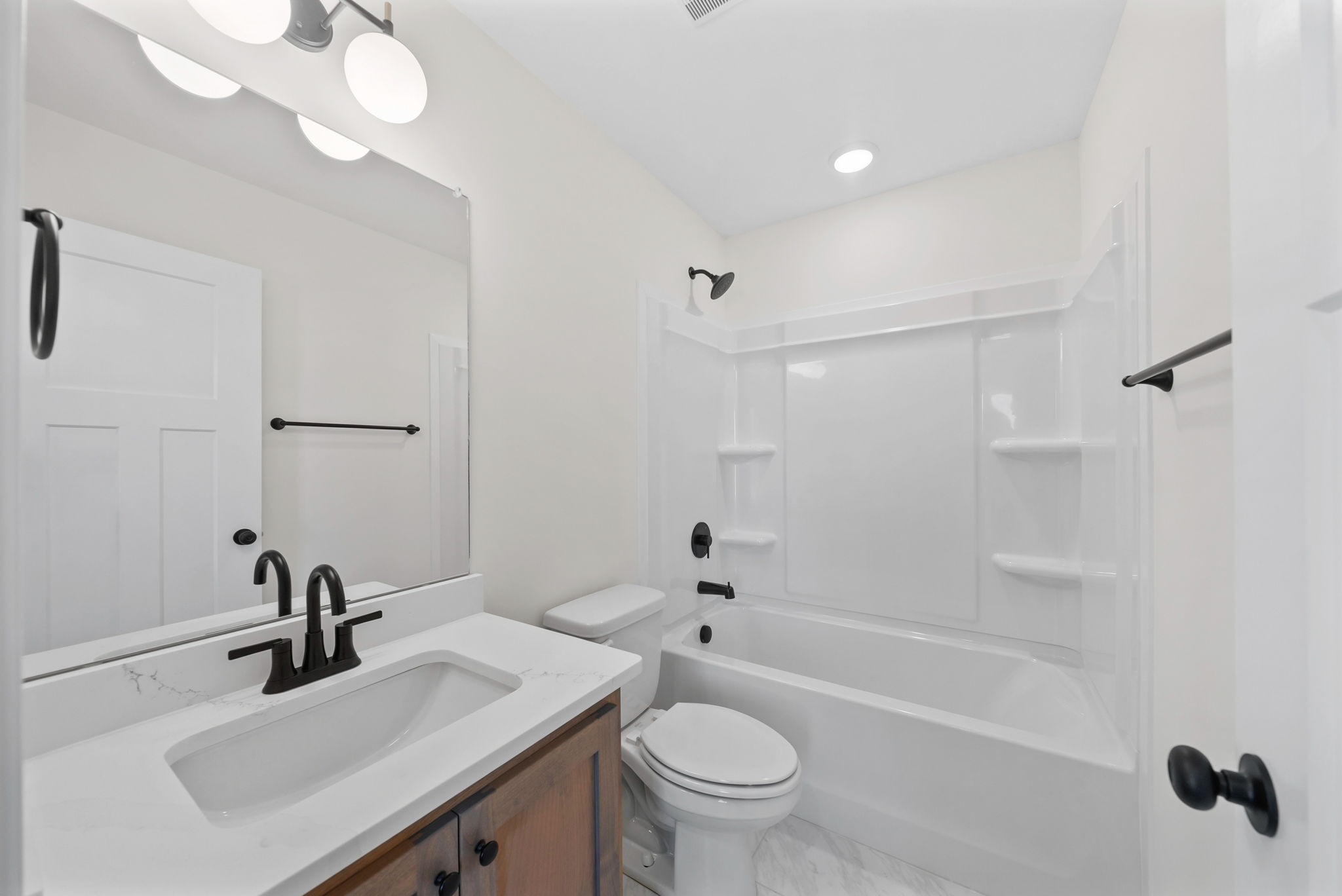 1593 Collins View Way Clarksville, TN 37043 - Photo 29 of 49 a bathroom with a sink a toilet and shower