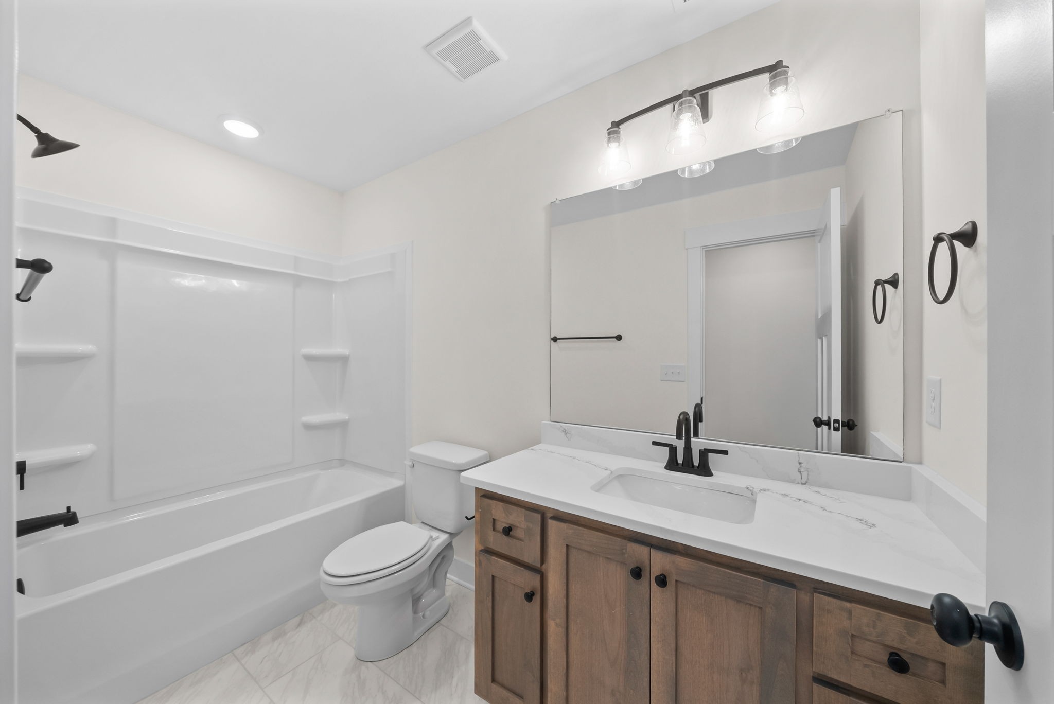 1593 Collins View Way Clarksville, TN 37043 - Photo 32 of 49 a bathroom with a sink a toilet and shower