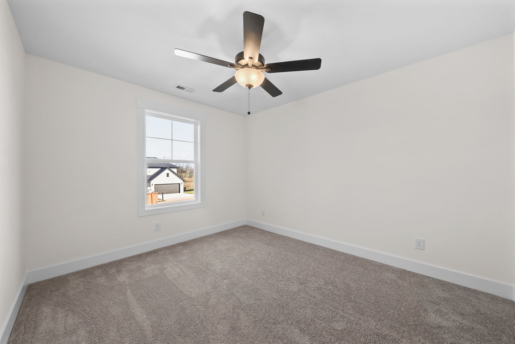 1593 Collins View Way Clarksville, TN 37043 - Photo 33 of 49 an empty room with windows and fan