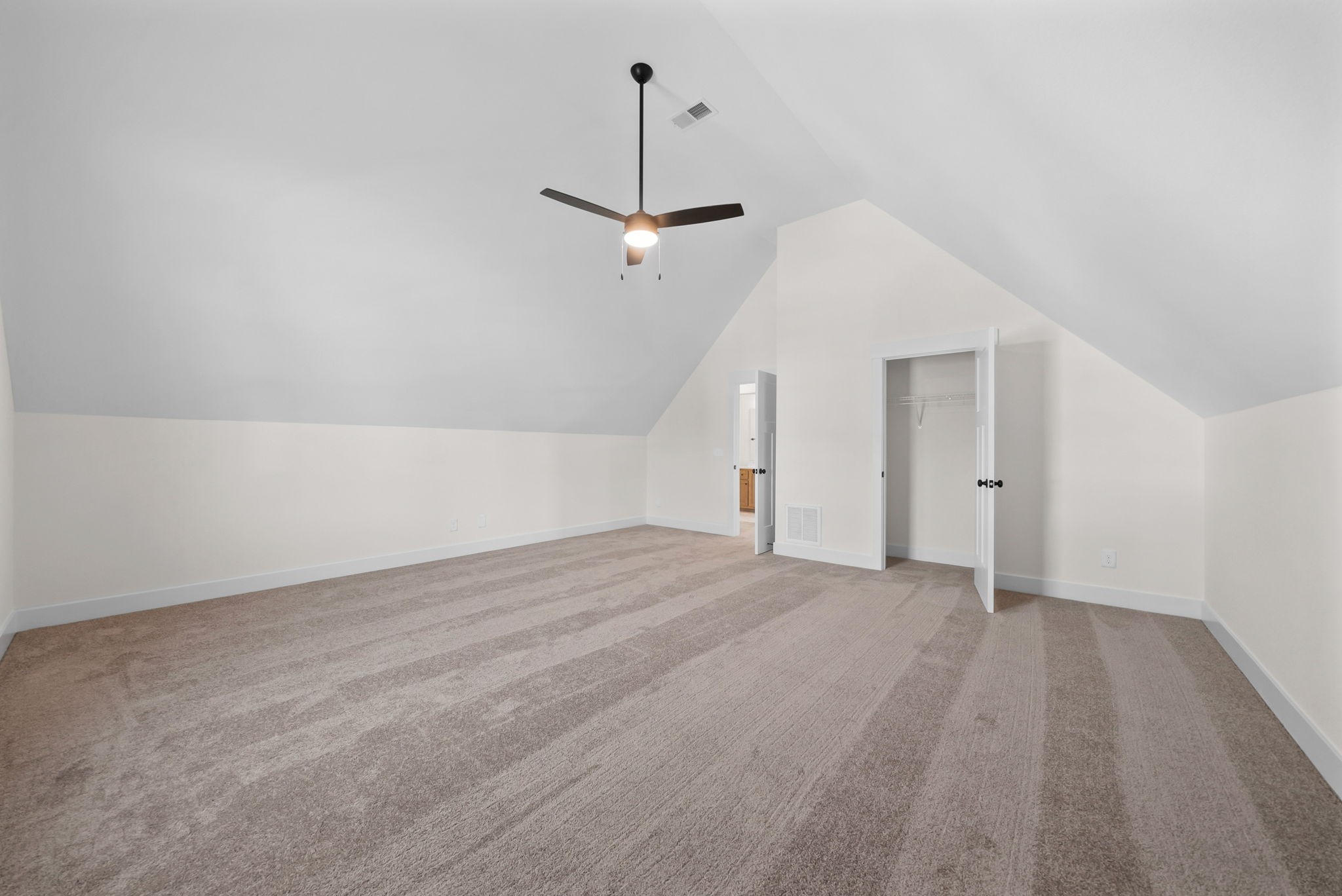 1593 Collins View Way Clarksville, TN 37043 - Photo 36 of 49 a view of empty room with wooden floor and ceiling fan