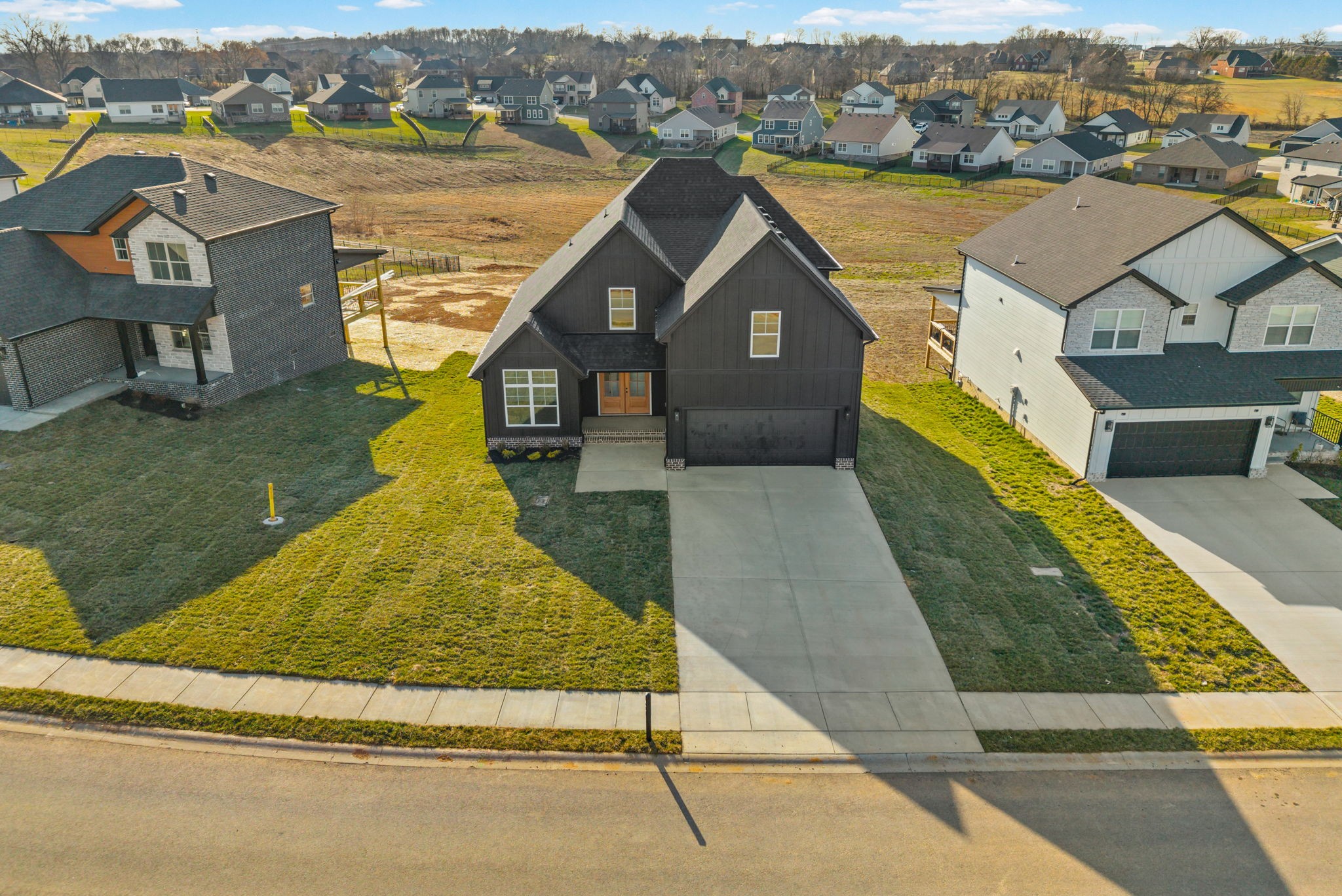 1593 Collins View Way Clarksville, TN 37043 - Photo 41 of 49 an aerial view of a house with a ocean view
