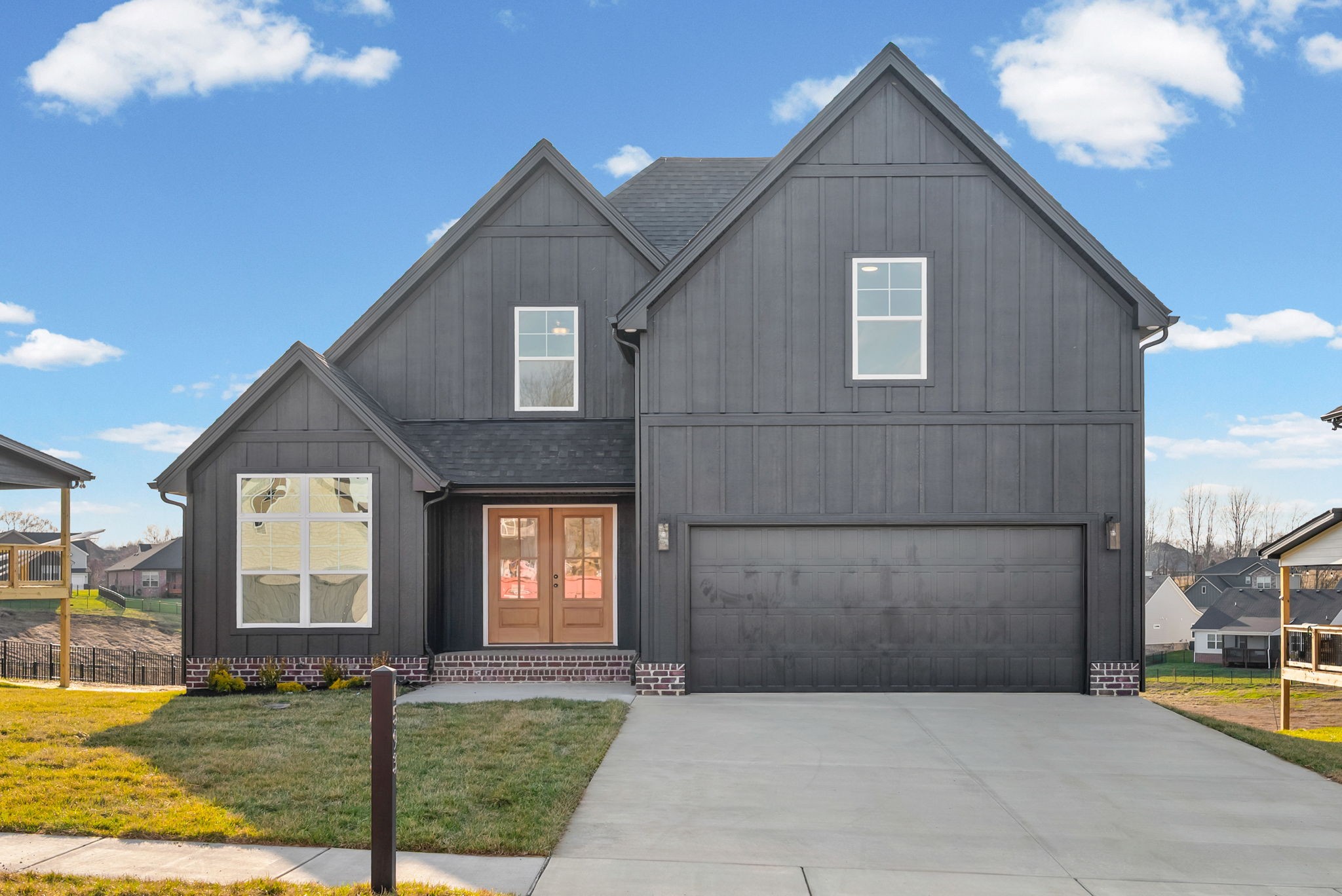 1593 Collins View Way Clarksville, TN 37043 - Photo 45 of 49 a front view of a house with garden