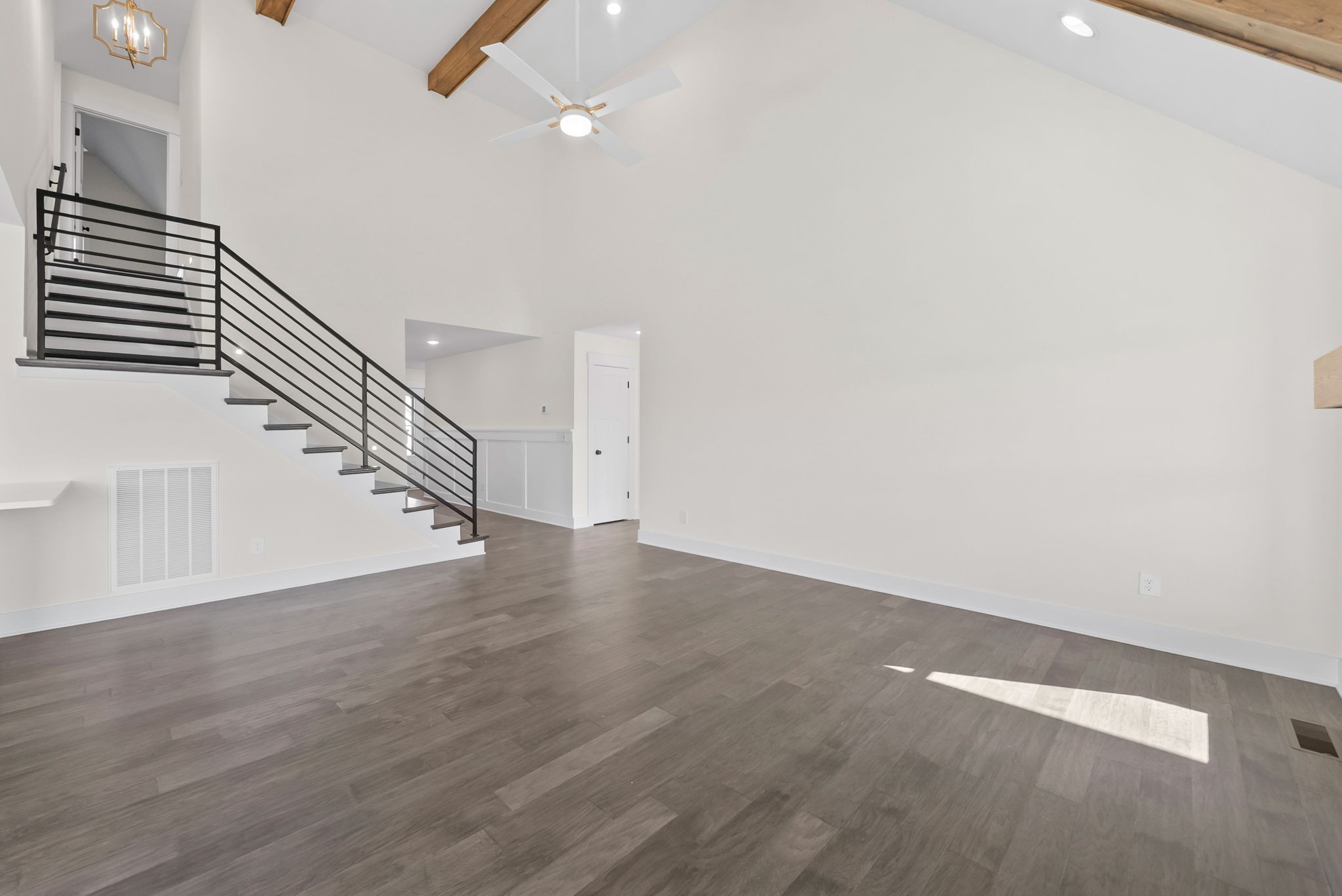 1593 Collins View Way Clarksville, TN 37043 - Photo 8 of 49 a view of an empty room with wooden floor