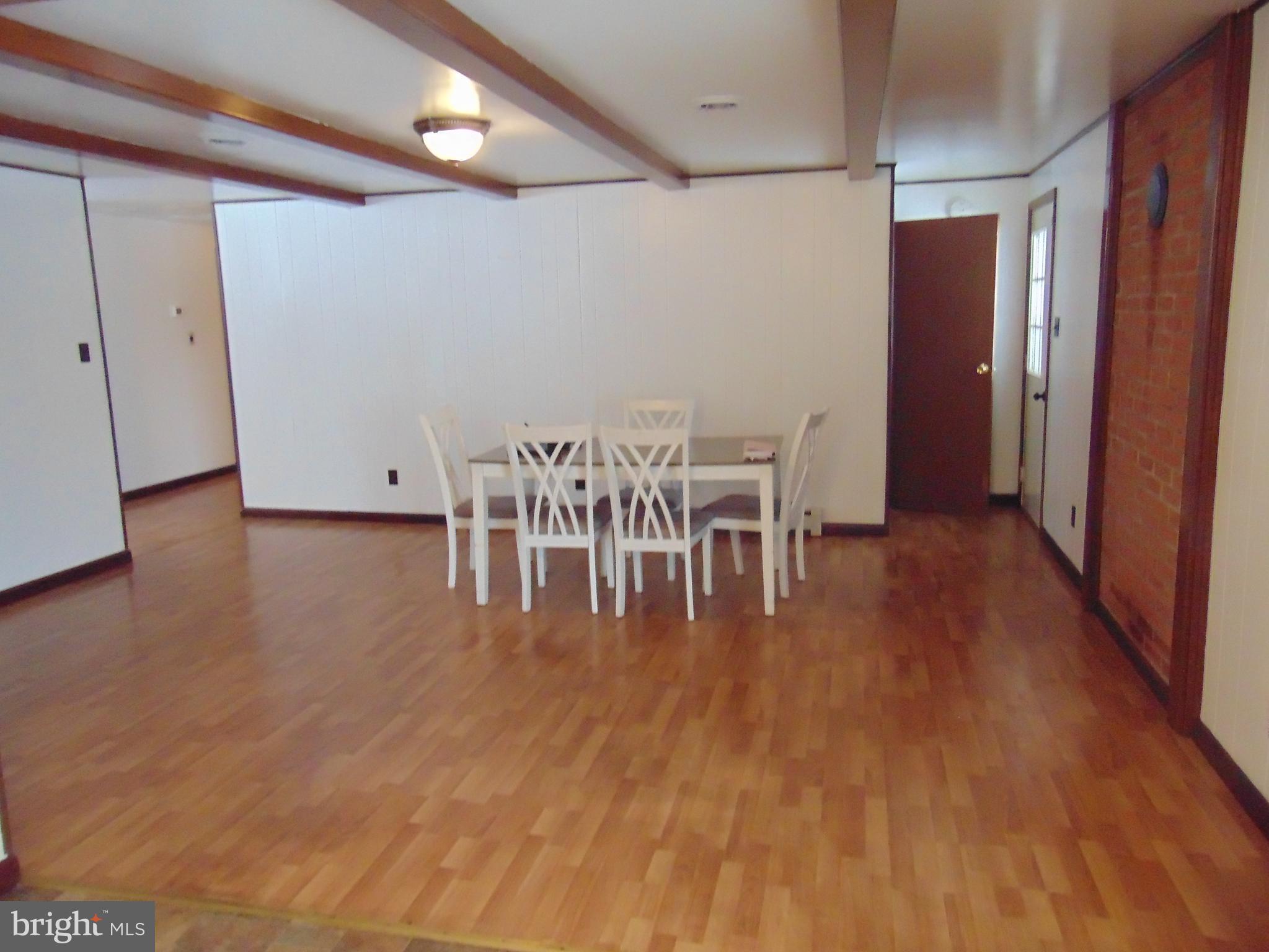 2029 Reed Road Knoxville, MD 21758 - Photo 22 of 96 Formal dining room exposed beams