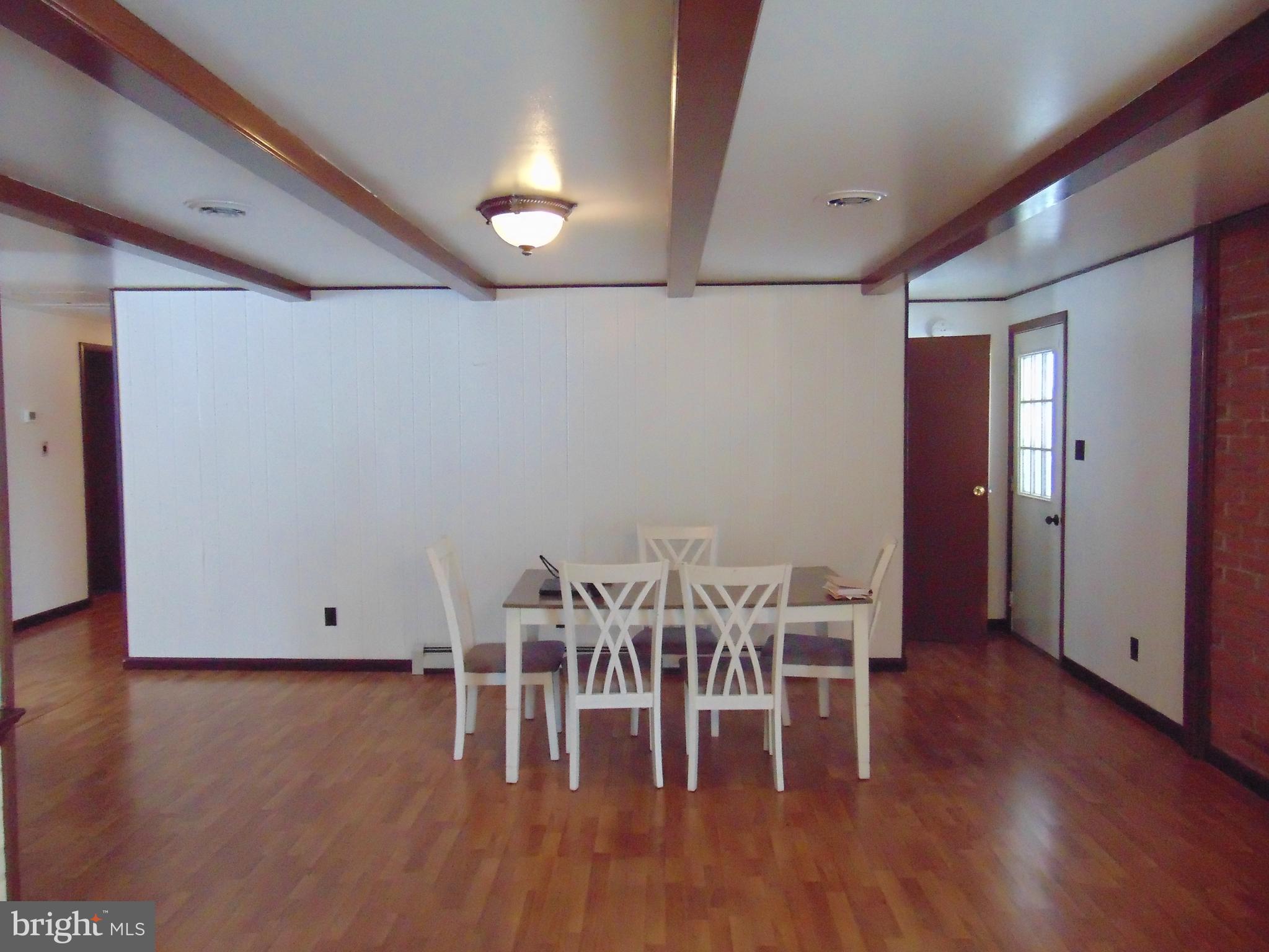 2029 Reed Road Knoxville, MD 21758 - Photo 23 of 96 Formal dining room exposed beams
